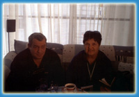 Елена и Румен Смилевски в ателието на художника Павел Митков, март 2003